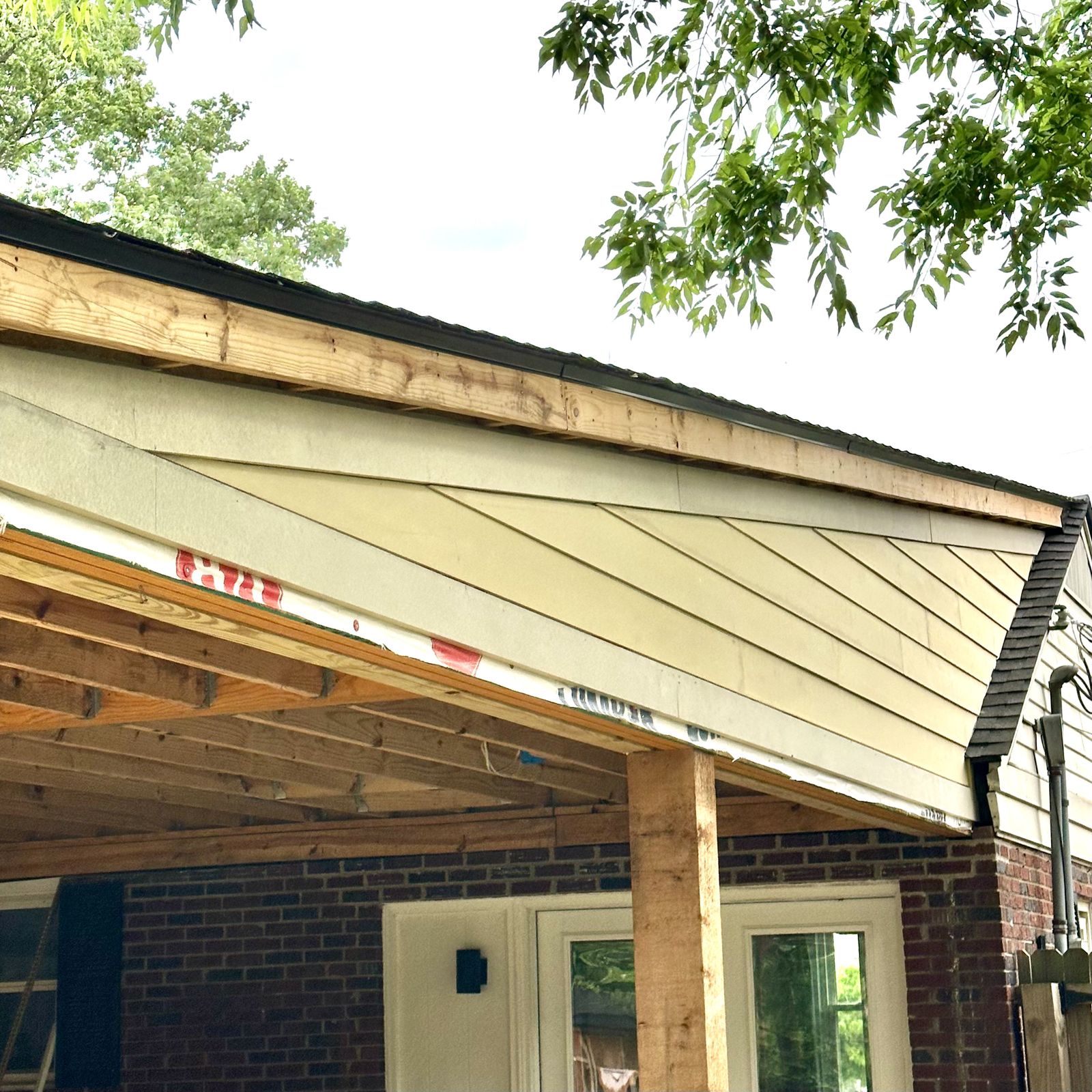 Siding detail at an angled gable soffit