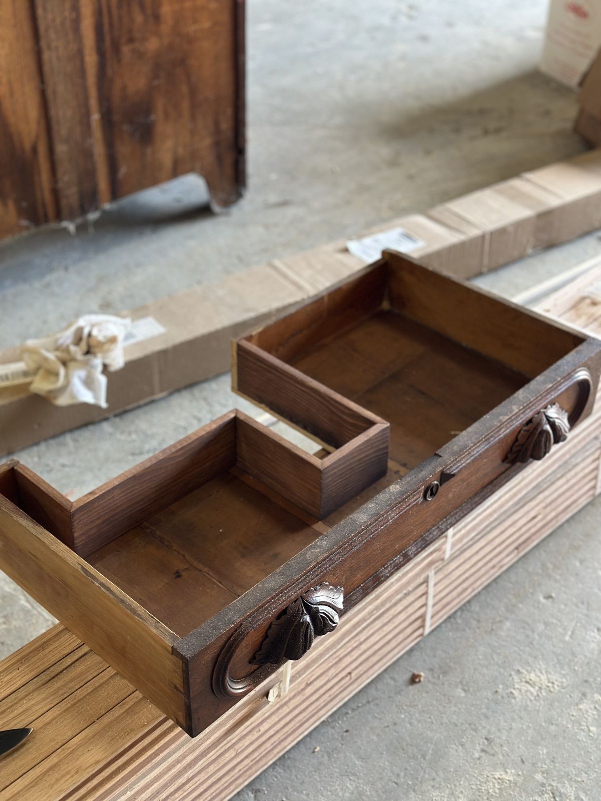 Custom built wood drawer with ornate hardware